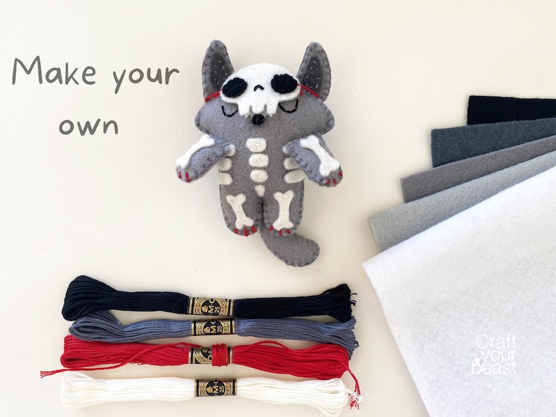 Halloween-themed skeleton wolf plush made from a felt sewing pattern, displayed with sewing felt materials.