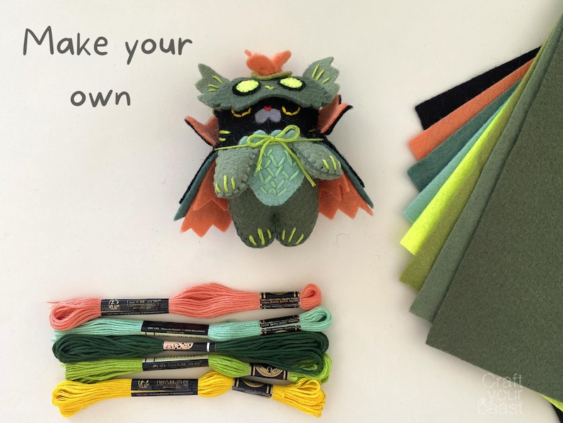 Halloween-themed swamp Cat plush made from a felt sewing pattern, displayed with materials.