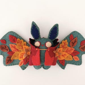 Stuffed bat plush toy, handcrafted from felt, ideal for gothic, witchy, or spooky home decor.
