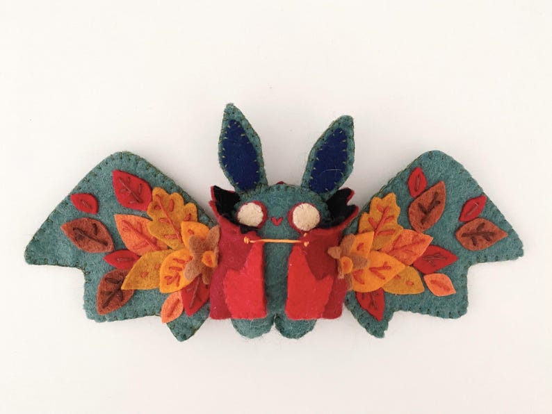 Stuffed bat plush toy, handcrafted from felt, ideal for gothic, witchy, or spooky home decor.