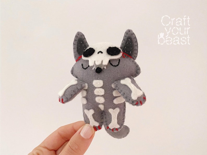 Stuffed halloween wolf plush toy, handcrafted from felt, ideal for gothic, witchy, or spooky home decor.