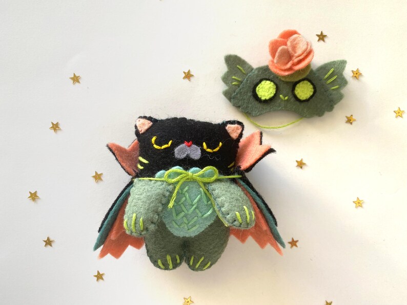Stuffed halloween cat plush toy, handcrafted from felt, ideal for gothic, witchy, or spooky home decor.