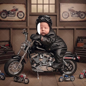 May include: A baby dressed in a black leather jacket, pants, and helmet, sitting on a black motorcycle. Miniature toy motorcycles are scattered around the floor. The background features vintage motorcycle art.