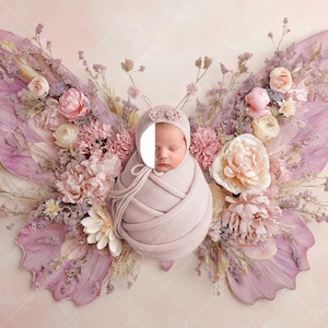 May include: A newborn baby wrapped in a soft, pink blanket and hat, nestled within a floral butterfly arrangement. The wings are crafted from delicate, lavender-colored petals, adorned with various pastel-colored flowers.