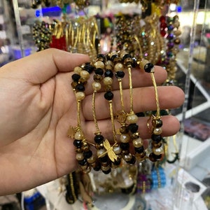 Black, brown and beige bead bracelet