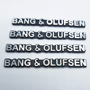 4 badge in alluminio Bang & Olufsen