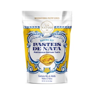 Portuguese Custard Tarts famously known as Pastel de Nata is presented in a White Stand-up Pouch with a yellow and blue portuguese design. The Pouch includes the Crust Mix, the Custard Mix and the Molds to make 12 Natas. Net weight is 10.2 oz,288 gr.