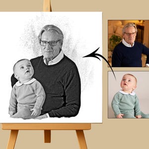 May include: Black and white portrait of a man holding a baby, both looking upwards. The portrait is on a white canvas, displayed on a wooden easel. Two smaller color photos of the subjects are also included.