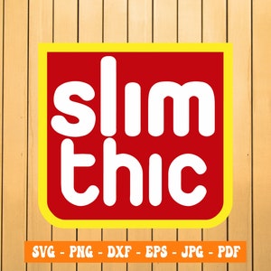 May include: A red square with a yellow border, containing the text "slim thic" in white letters. The background is a wood grain pattern.