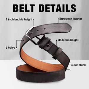 May include: A dark brown leather belt with a silver-toned metal buckle, featuring the text BELT DETAILS, 2 inch buckle height, European leather, 36.6 mm height, 5 holes, and 4 mm thick. The belt has a smooth dark exterior and a tan interior lining.