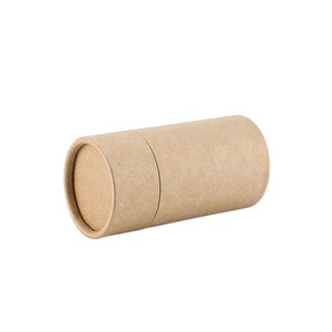 May include: A brown cardboard tube with a round opening at one end.