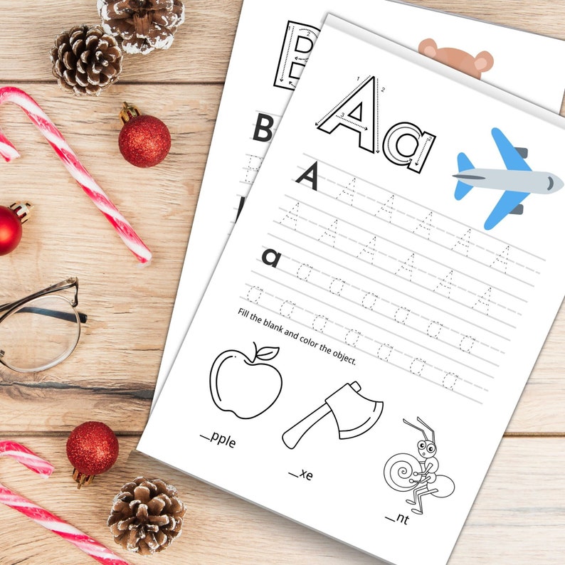 May include: A printable worksheet for kids to practice writing the letter A. The worksheet includes a large capital A and lowercase a, tracing lines, and a section to fill in the blanks and color the objects: an apple, an axe, and an ant.