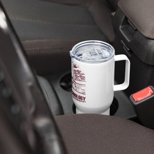 Travel mug with a handle