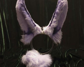 Cosplay di Jax con le orecchie da coniglio viola dal fantastico circo digitale