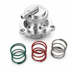 May include: A silver-colored automotive part with the word "Forge" on top. The part has a cylindrical body with a nozzle and a base with three mounting holes. Three colored springs, green, red, and gray, are positioned below the part.