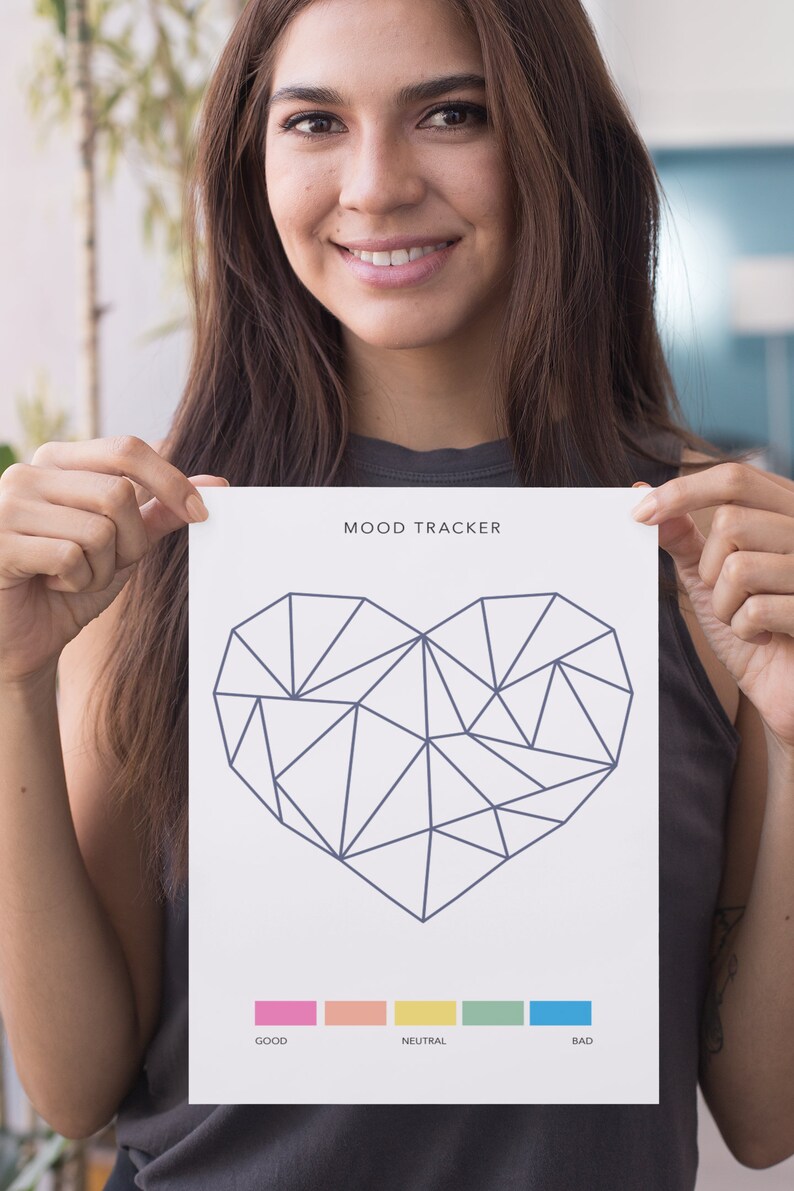 May include: A printable mood tracker with a geometric heart design. The heart is divided into triangles and can be colored in with different colors to track mood. The color key includes pink for good, orange for neutral, yellow for neutral, green for neutral, and blue for bad.