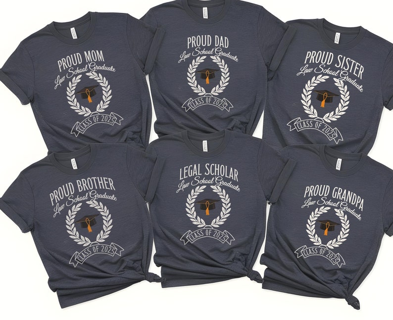 May include: Six navy blue t-shirts with white text and graphics. The shirts say "Proud Mom", "Proud Brother", "Proud Dad", "Proud Sister", "Legal Scholar", and "Proud Grandpa". Each shirt has a graduation cap and laurel wreath graphic and the text "Law School Graduate" and "Class of 2025".
