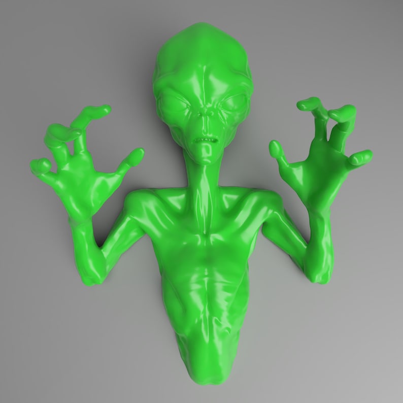 Puede incluir: Una figura de alien&iacute;gena verde brillante con los brazos y las manos extendidos. El alien&iacute;gena tiene una cabeza grande, ojos almendrados y un cuerpo delgado. La figura se encuentra sobre un fondo gris, creando un contraste llamativo. El dise&ntilde;o es suave y moderno.