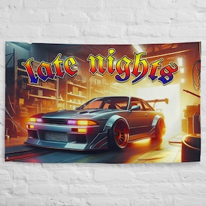May include: A blue and silver car with a large spoiler in a garage with the words "late nights" in a colorful font above the car.