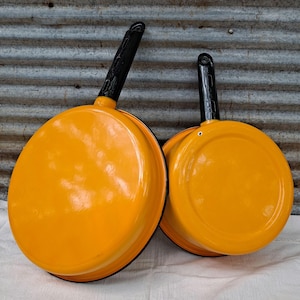 enamel saucepan and frying pan set.