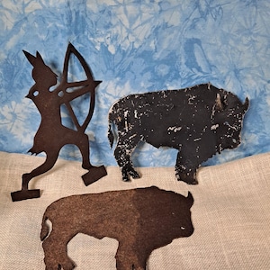 Three metal American Indian art pieces
