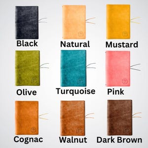 May include: Nine different colored leather notebook covers. The colors are black, natural, mustard, olive, turquoise, pink, cognac, walnut, and dark brown.