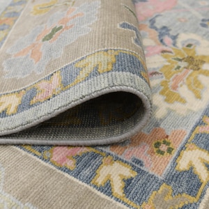 Hand Knotted Wool Oushak Rug: Pastel Blue Floral Persian Rug