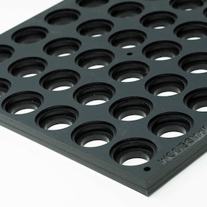May include: Black plastic storage tray with 36 round holes. The tray is labeled "WOODCRAFT.COM".