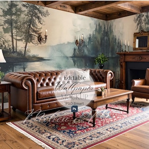Puede incluir: Maqueta de interior de salón con un sofá Chesterfield de cuero marrón, una mesa de centro de madera y una alfombra estampada. Las paredes muestran un papel pintado escénico con un diseño de lago y bosque. Texto "Editable Wallpaper Mockup".