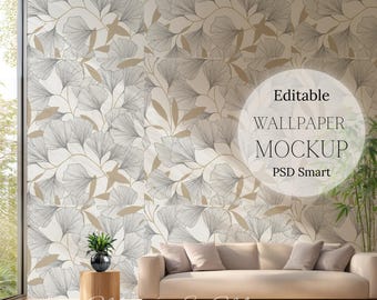 May include: A mockup of a living room with a white couch and a plant on a wooden table. The wall is covered with a wallpaper featuring a pattern of brown and gray leaves. The text "Editable Wallpaper Mockup PSD Smart" is visible in a circle on the wall.