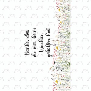 May include: A white card with a floral border of pink, yellow, and green wildflowers. The card features the German text "Danke, dass du mir beim Wachsen geholfen hast" in black script.