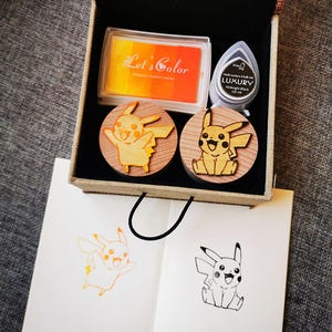 Wooden stamps in Kawaii manga style and Handmade craft and Ink pad Offered randomly