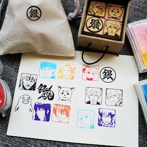 Wooden stamps with Japanese manga kawaii style and handmade, random ink pad offered