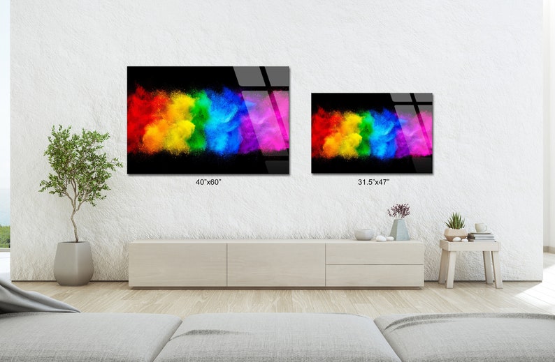 May include: Two colorful abstract art prints with a rainbow explosion of color on a black background. The larger print is 40 inches by 60 inches and the smaller print is 31.5 inches by 47 inches.