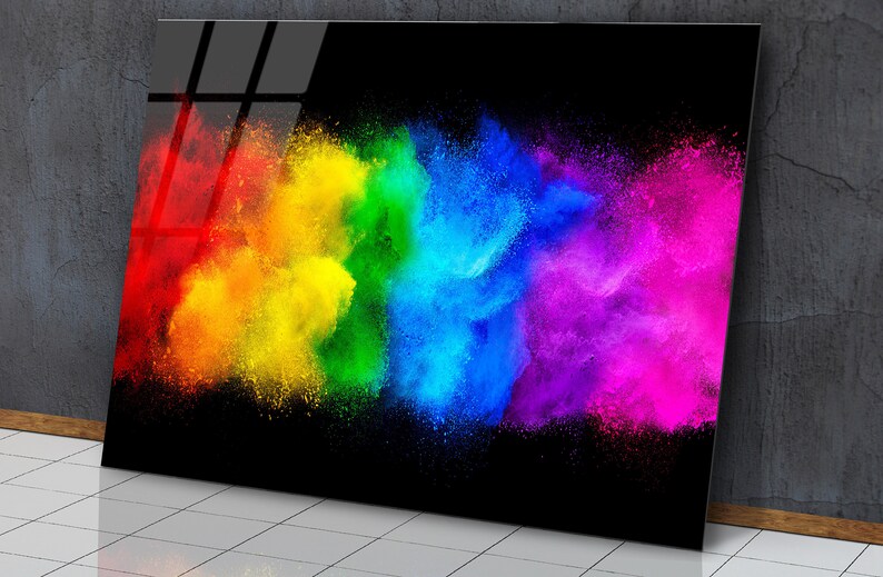 May include: A colorful abstract art print featuring a rainbow of colors in a cloud-like formation against a black background.