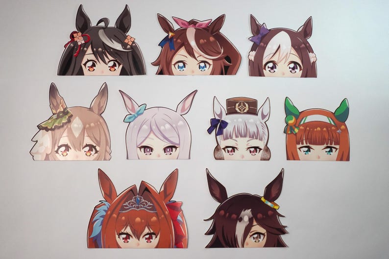 May include: A collection of nine anime-style character cutouts, each featuring a unique hairstyle and eye color. The designs include various hair colors such as black, brown, and red, with decorative elements like bows and headbands.