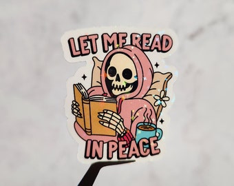 Let Me Read In Peace Skelly Holographic Sticker, Bookish Skeleton Sticker, Booktok Laptop/Water Bottle Sticker, Spooky Bookworm Gift