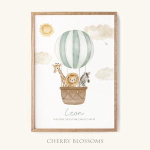 May include: Watercolor print of a hot air balloon with a giraffe, lion, and zebra. The balloon is light green and white. The print is in a wooden frame. The name "Leon" is written below the balloon.