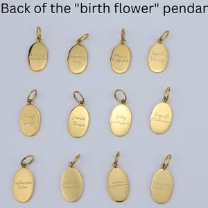 May include: Gold-colored oval pendants with handwritten birth flower names. Each pendant has a small loop at the top for a chain. The text includes names like "March Daffodil" and "April Daisy".