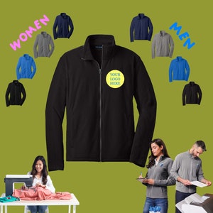May include: Black fleece jacket with a zipper closure and a yellow logo that says "Your Logo Here". The jacket is shown on a green background with other jackets in different colors.