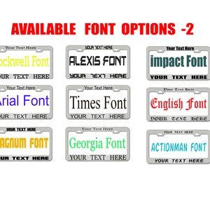 May include: A selection of ten different font styles for personalized license plates. The fonts are displayed on a silver license plate frame with the text "Your Text Here" below each font.