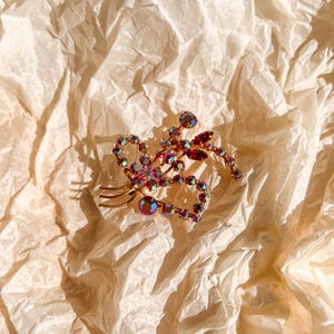 Vintage 1950s Iridescent Pink Rhinestone Bow Brooch