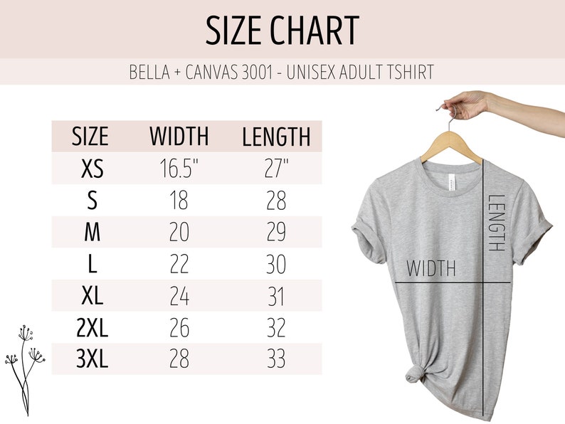 May include: Size chart for a unisex adult t-shirt, showing width and length measurements in inches for sizes XS to 3XL. The chart shows a gray t-shirt hanging on a wooden hanger.