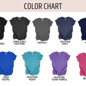May include: Color chart showing 10 different t-shirt colors: Solid Black Blend, Dark Grey Heather, Asphalt, Heather Navy, Navy, True Royal, Heather Aqua, Heather Team Purple, and Berry.