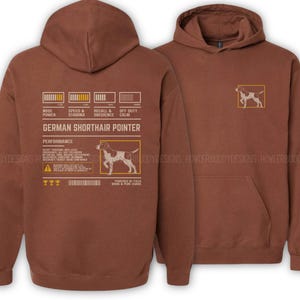 May include: A set of three ceramic mugs with a speckled, matte finish. The mugs are in cream, light grey, and dark grey. Each mug has a simple, minimalist design, ideal for coffee or tea.