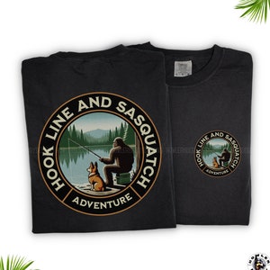 May include: Black t-shirt with a circular graphic of a Bigfoot fishing with a dog. The graphic says "Hook Line and Sasquatch Adventure".