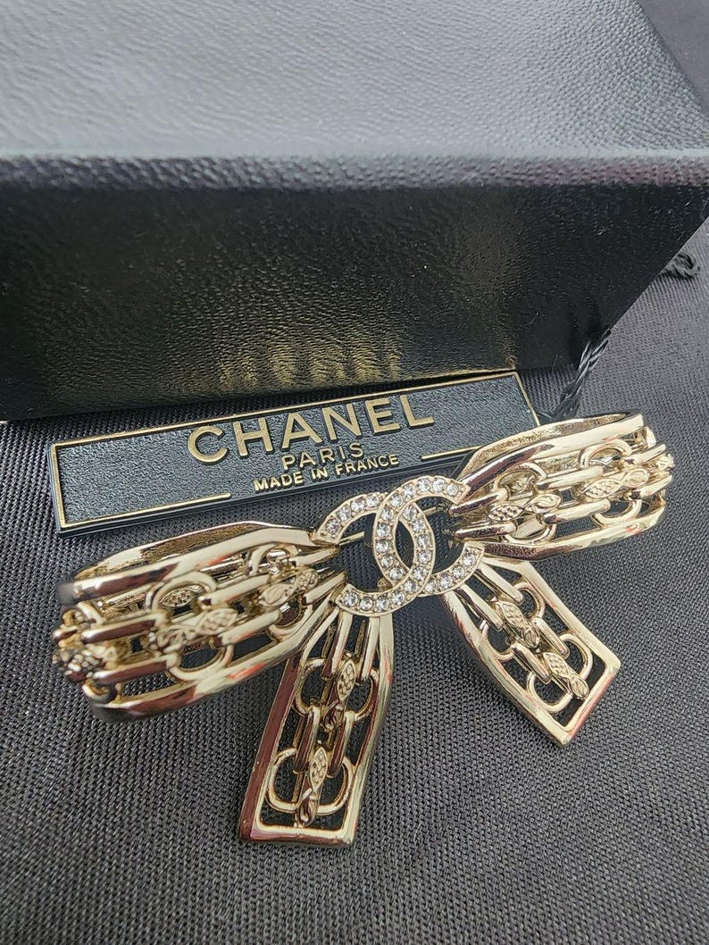 Auth CHANEL CC Bow Crystals Brooch image 1