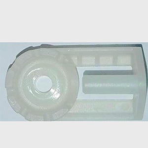 May include: White plastic curtain slider with a round knob and a slot for a curtain rod.