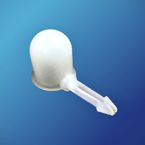 May include: A white plastic connector with a round head and a pointed end.