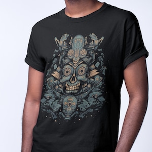 May include: A black t-shirt with a graphic print of a blue and gold skull with intricate details. The skull is surrounded by smaller figures and patterns.